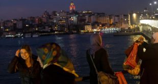 ISTANBUL  TURKEY - FEBRUARY 23  Women take photographs from the Galata bridge on February 23  2017 in Istanbul  Turkey  Turkey will hold its constitutional referendum on April 16  2017  Turks will vote on 18 proposed amendments to the Constitution of Turkey  The controversial changes seek to replace the parliamentary system and move to a presidential system which would give President Recep Tayyip Erdogan executive authority  Campaigning will officially begin on February 25 with a pro referendum rally to be held in Ankara and attended by Prime Minister Binali Yildirim    Photo by Chris McGrath Getty Images